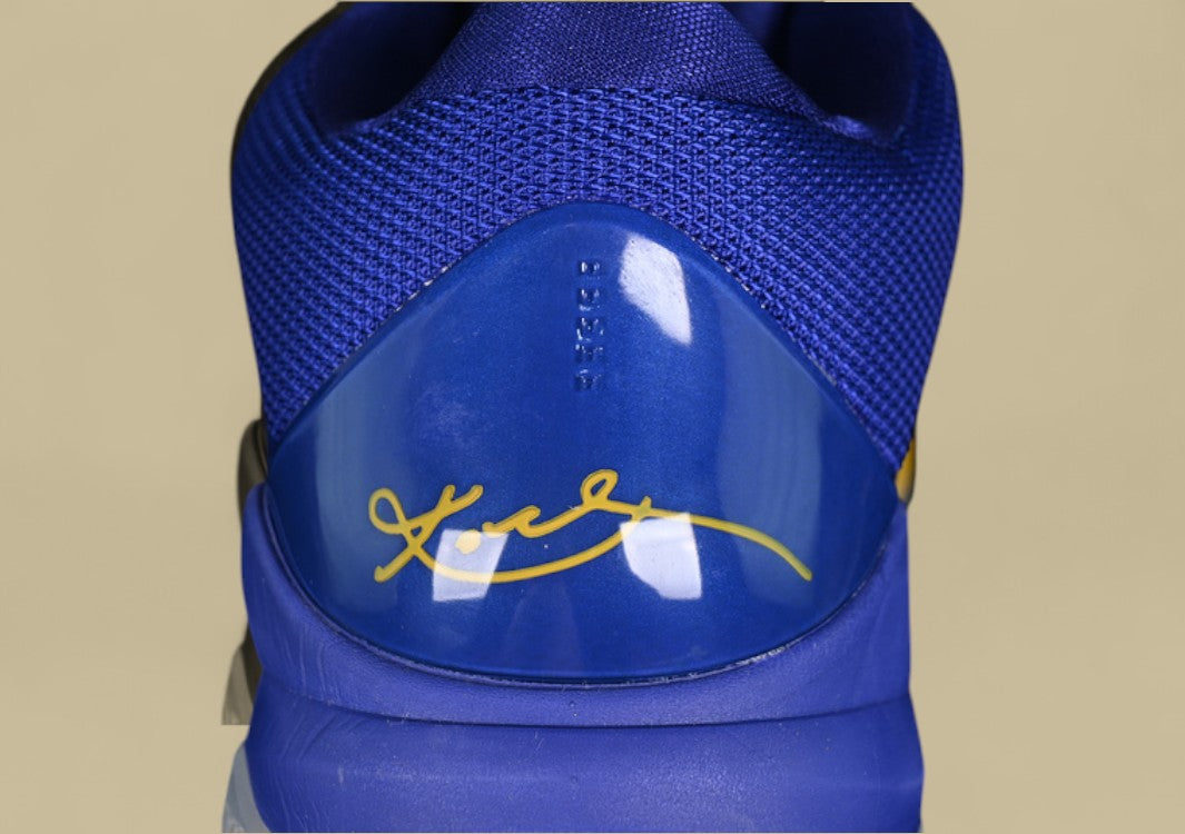 Nike Zoom Kobe "Concord Midwest Gold" Bold Graphic Low-Top Basketball Shoe with Vibrant Blue and Yellow Accents