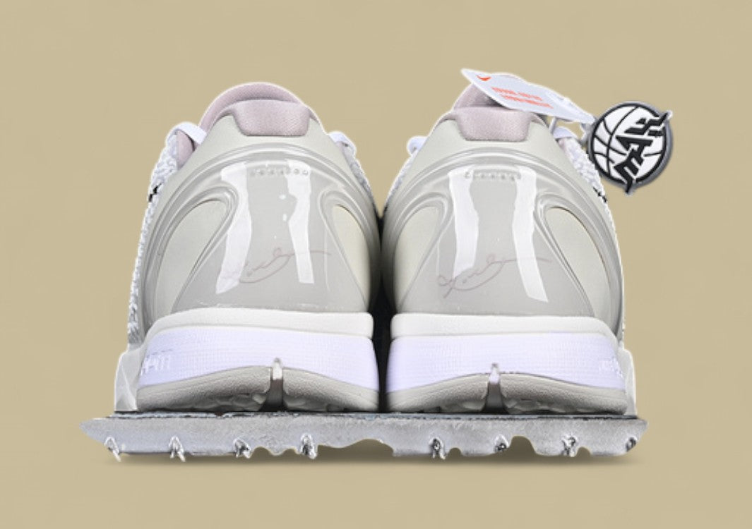 Nike Zoom Kobe Low Protro "Halo" Triple White Basketball Shoe with Black Heel Detail