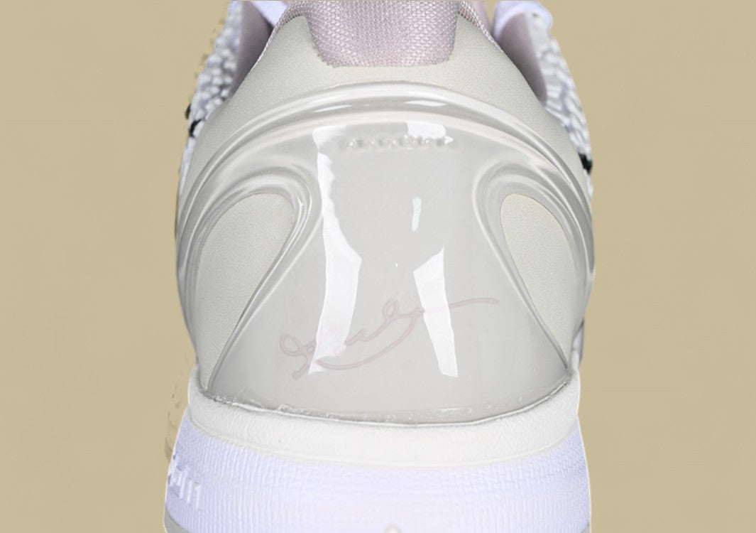 Nike Zoom Kobe Low Protro "Halo" Triple White Basketball Shoe with Black Heel Detail