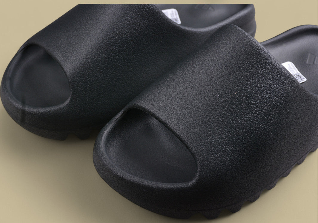 Yeezy Slide "Resin" Sleek Minimalist Black Comfort Slide