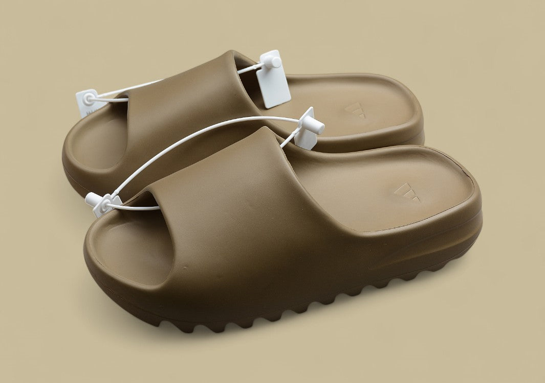 Yeezy Slide “Cocoa” Rugged Simplicity in Rich Brown Hue