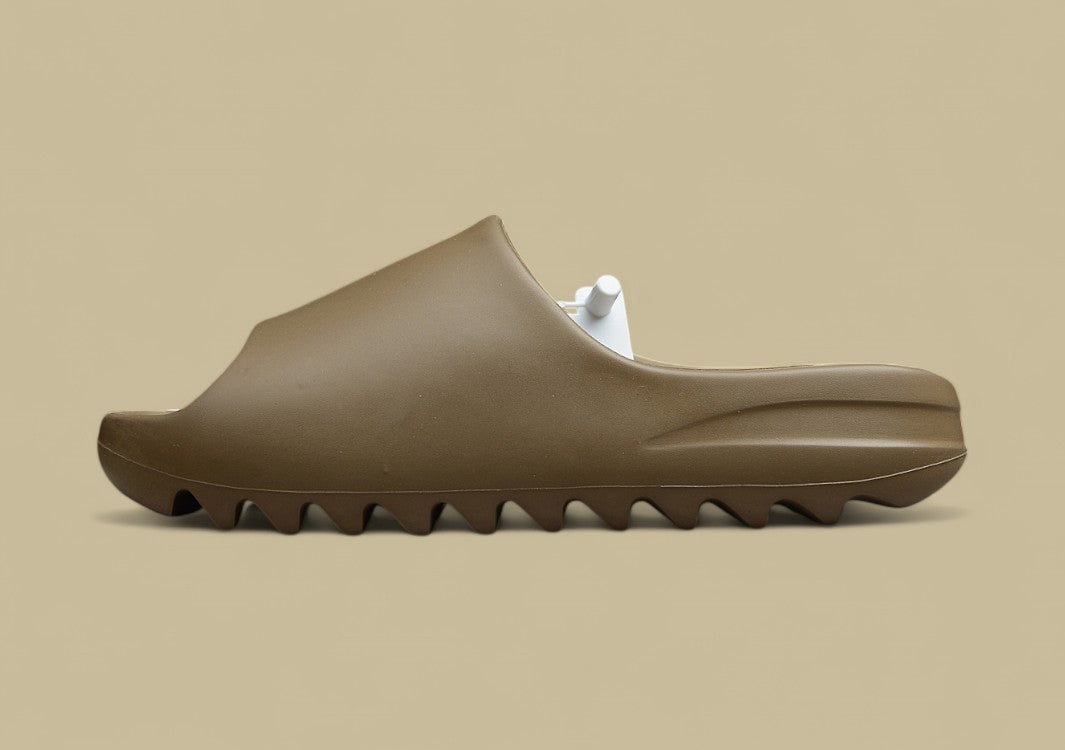 Yeezy Slide “Cocoa” Rugged Simplicity in Rich Brown Hue