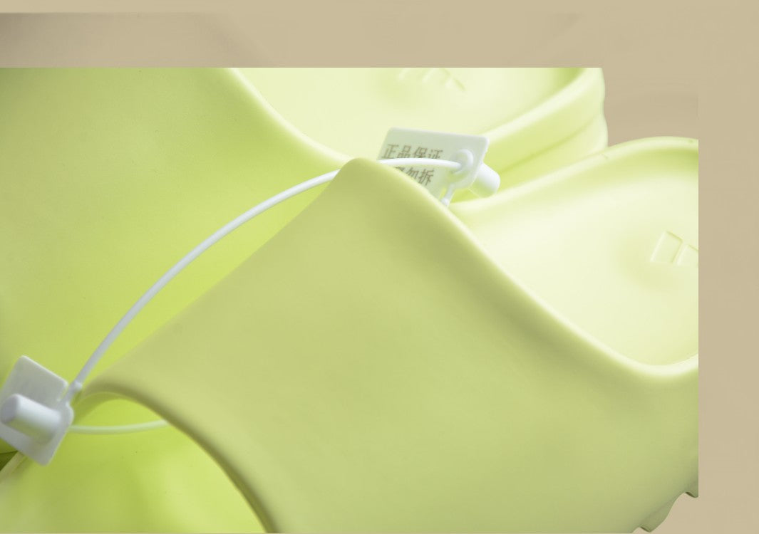 Yeezy Slide “Glow Green” Vibrant Comfort by Kanye