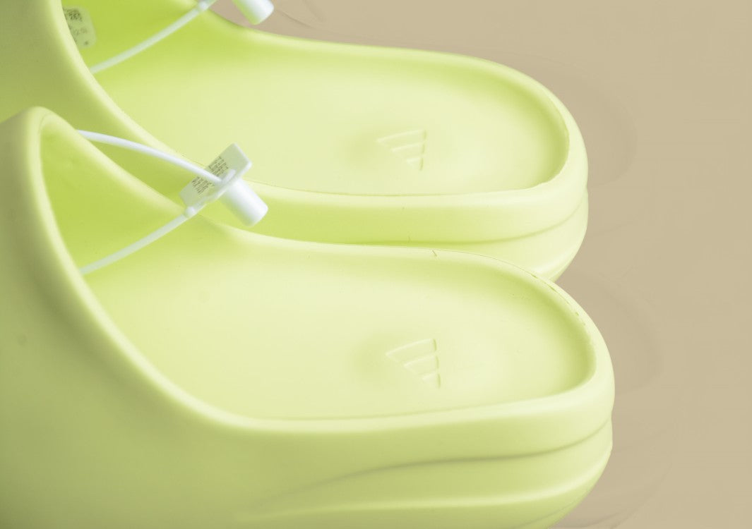 Yeezy Slide “Glow Green” Vibrant Comfort by Kanye