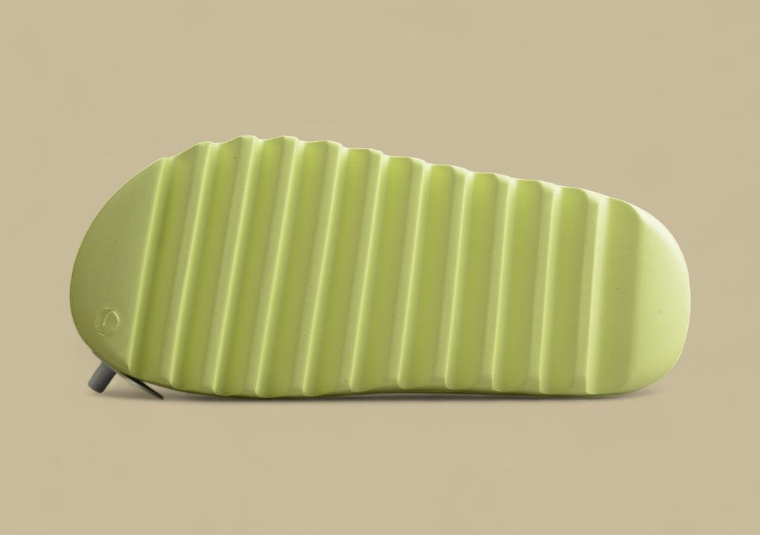 Yeezy Slide “Glow Green” Vibrant Comfort by Kanye