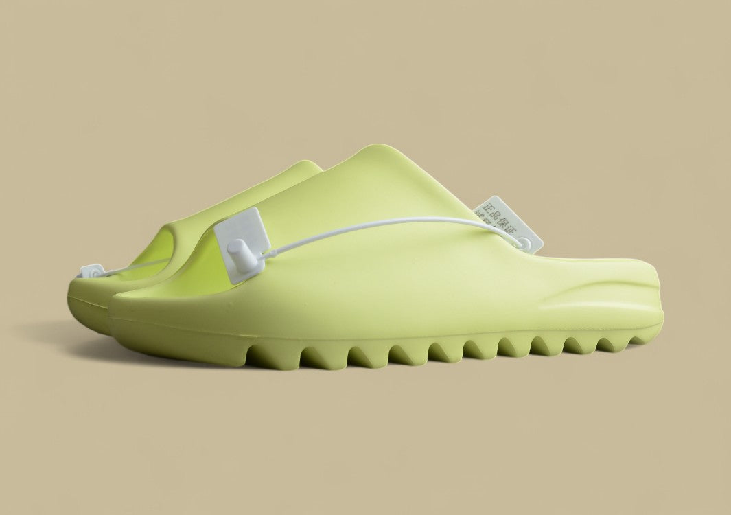 Yeezy Slide “Glow Green” Vibrant Comfort by Kanye